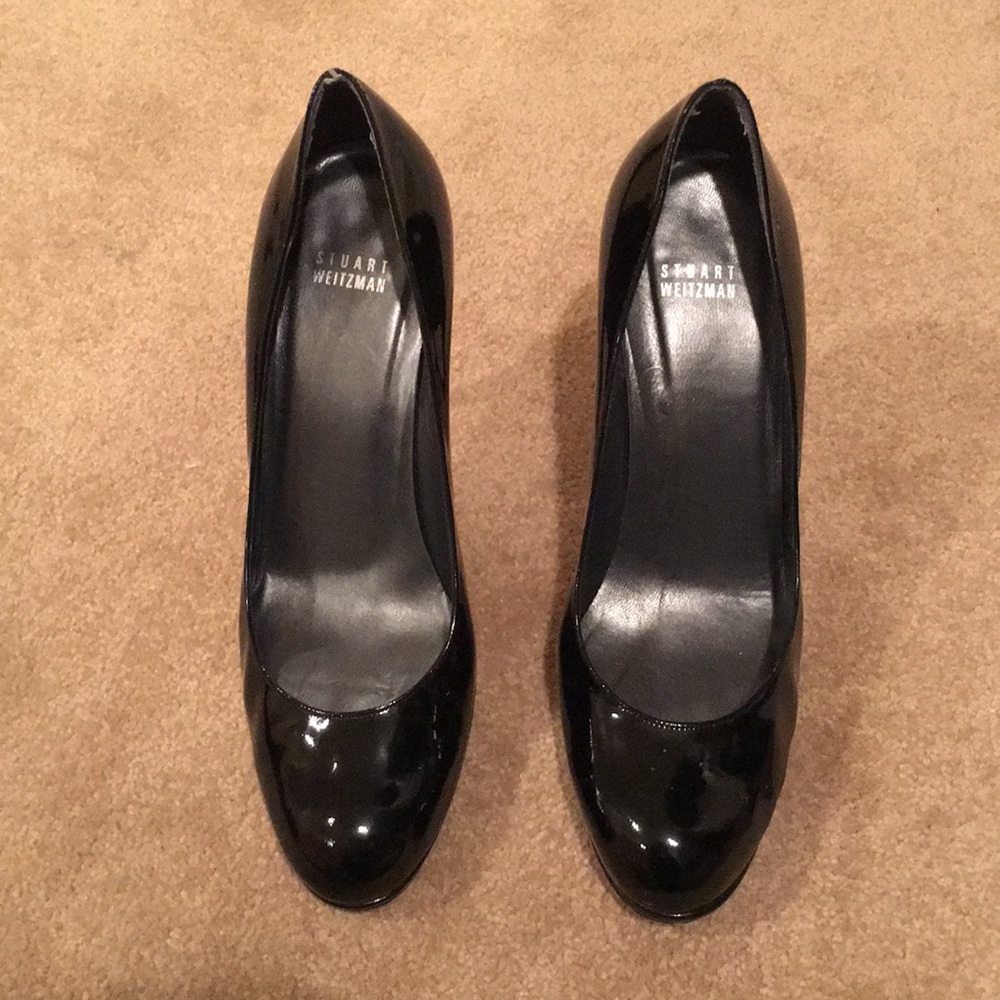 Black Stuart Weitzman patent leather pumps